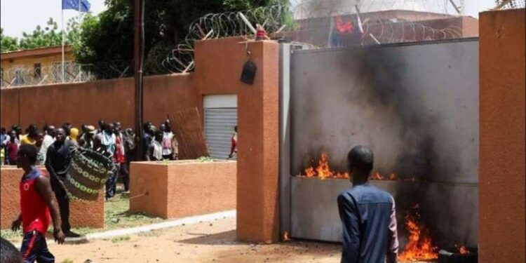 West Africa threatens force on Niger coup leaders, French embassy attacked