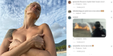 Üstsüz denize giren Didem Soydan, göğüslerini elleriyle kapatarak poz verdi